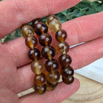 Barnsteen kinderarmband – curated crystal by Marga Jacobs | rust, symboliek en intuïtieve zelfzorg