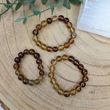 Barnsteen kinderarmband – curated crystal by Marga Jacobs | rust, symboliek en intuïtieve zelfzorg