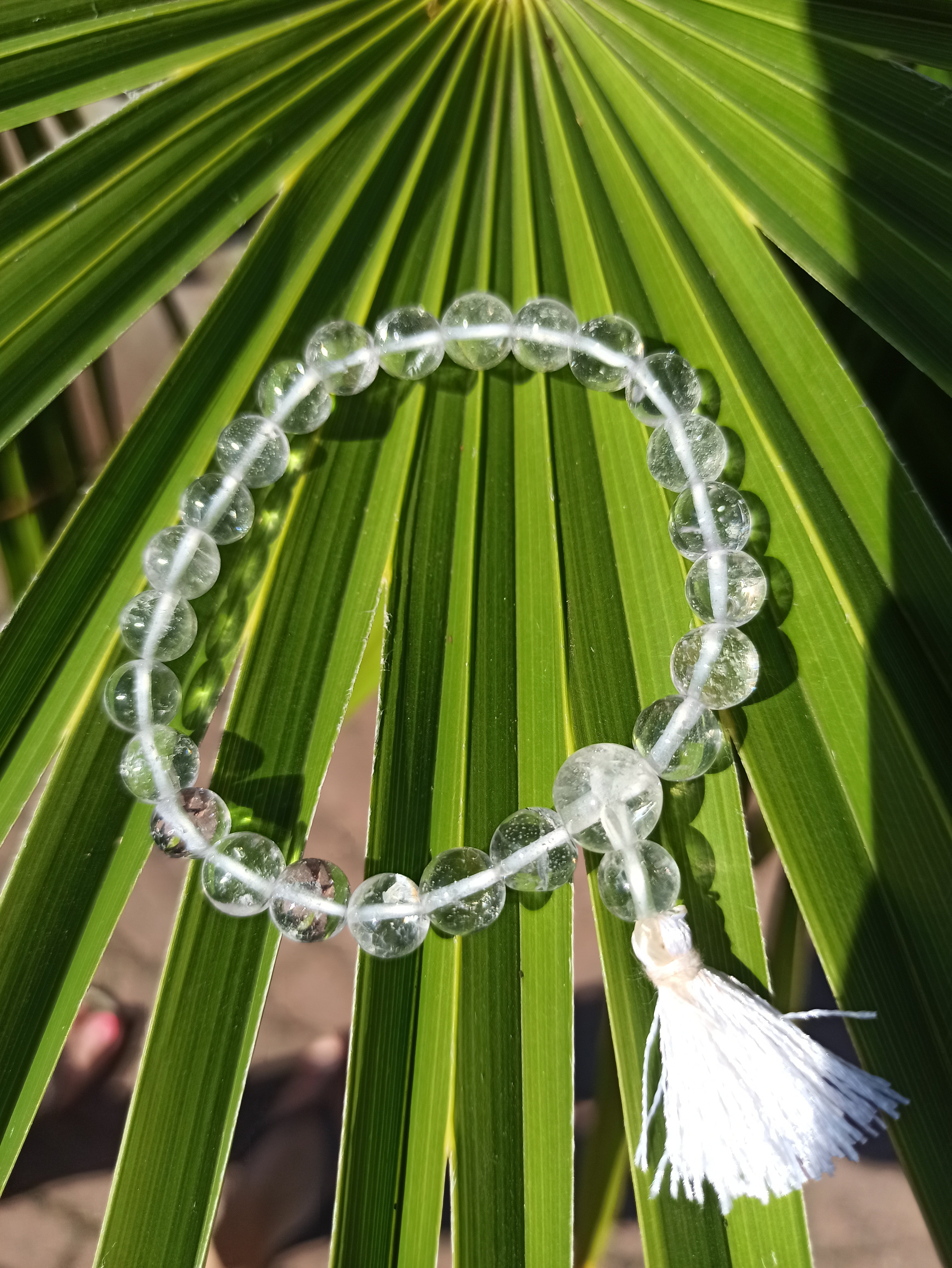 Bergkristal edelsteen armband met flosje | 8 mm | Marga Jacobs