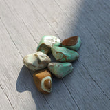 Adamiet trommelstenen – curated crystal by Marga Jacobs | rust, symboliek en intuïtieve zelfzorg