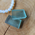 Andara obsidiaan trommelstenen – curated crystal by Marga Jacobs | rust, symboliek en intuïtieve zelfzorg