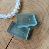 Andara obsidiaan trommelstenen – curated crystal by Marga Jacobs | rust, symboliek en intuïtieve zelfzorg