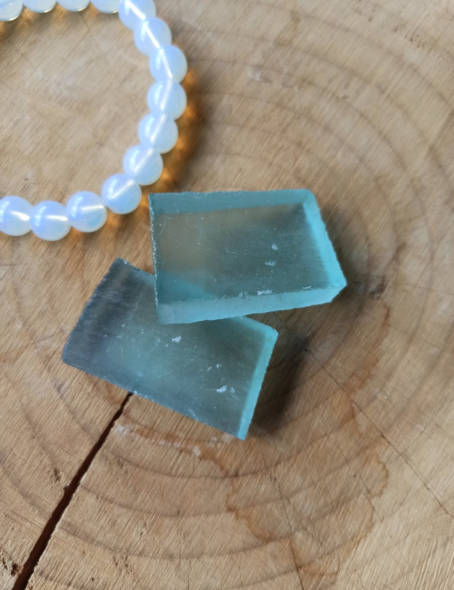 Andara obsidiaan trommelstenen – curated crystal by Marga Jacobs | rust, symboliek en intuïtieve zelfzorg