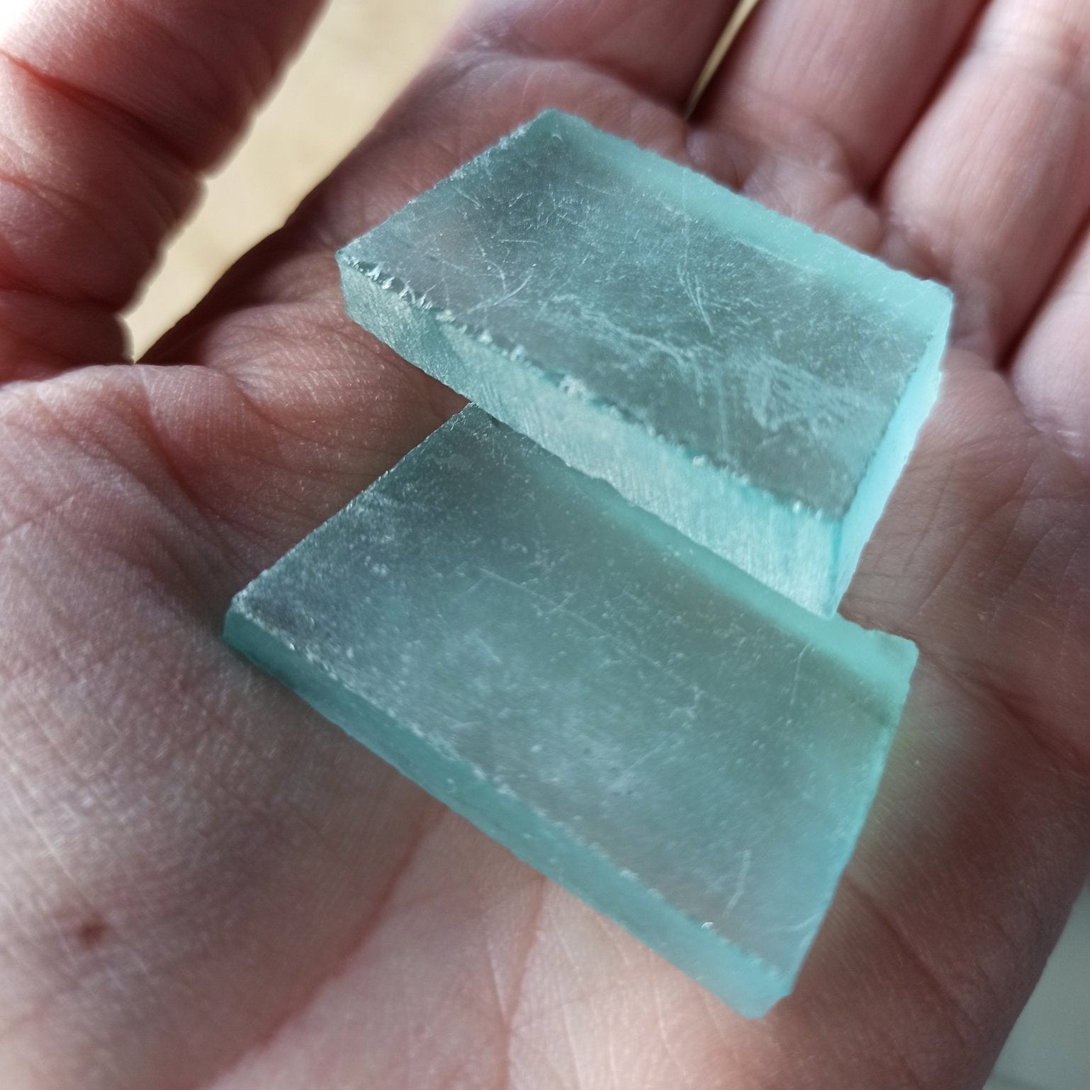 Andara obsidiaan trommelstenen – curated crystal by Marga Jacobs | rust, symboliek en intuïtieve zelfzorg