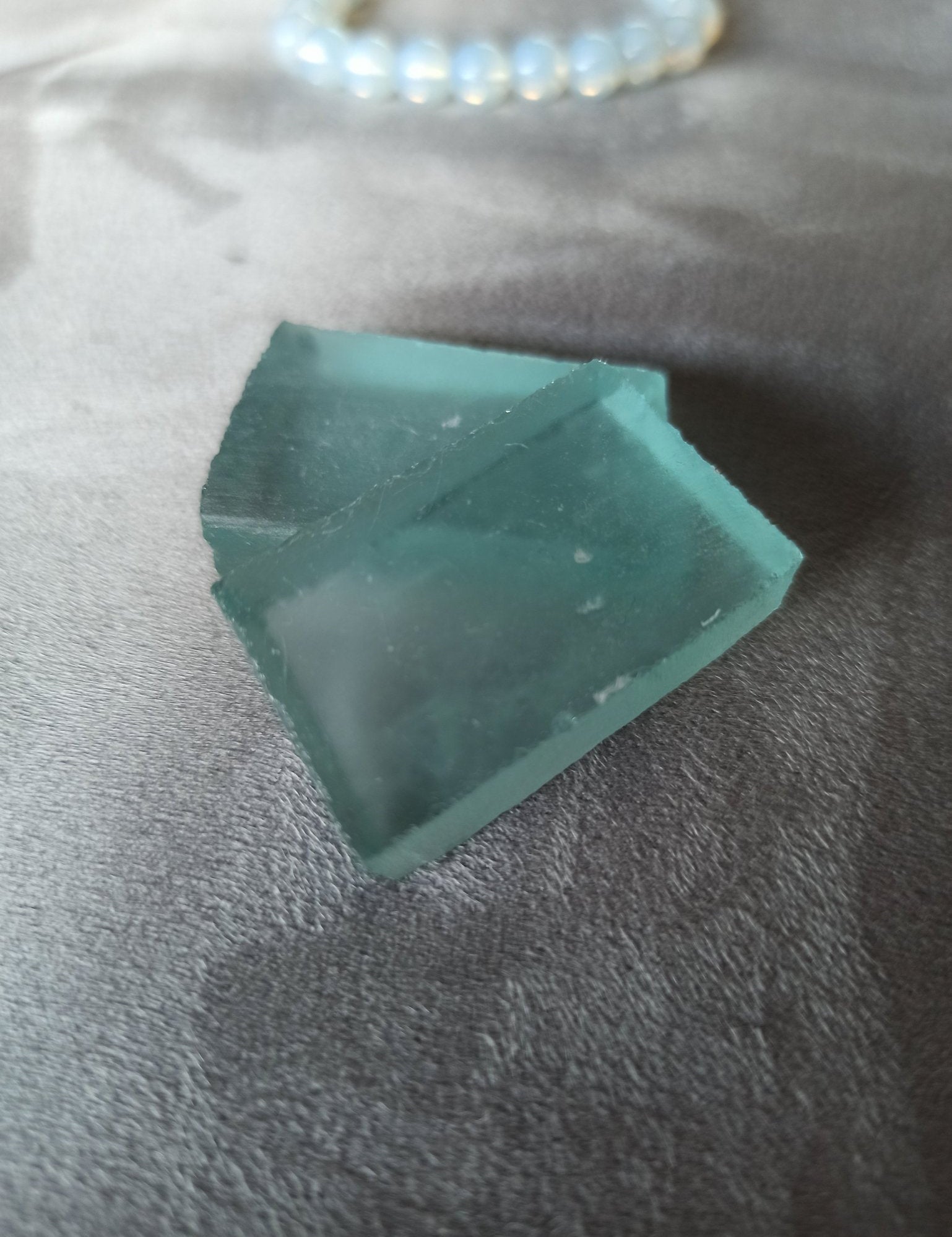 Andara obsidiaan trommelstenen – curated crystal by Marga Jacobs | rust, symboliek en intuïtieve zelfzorg