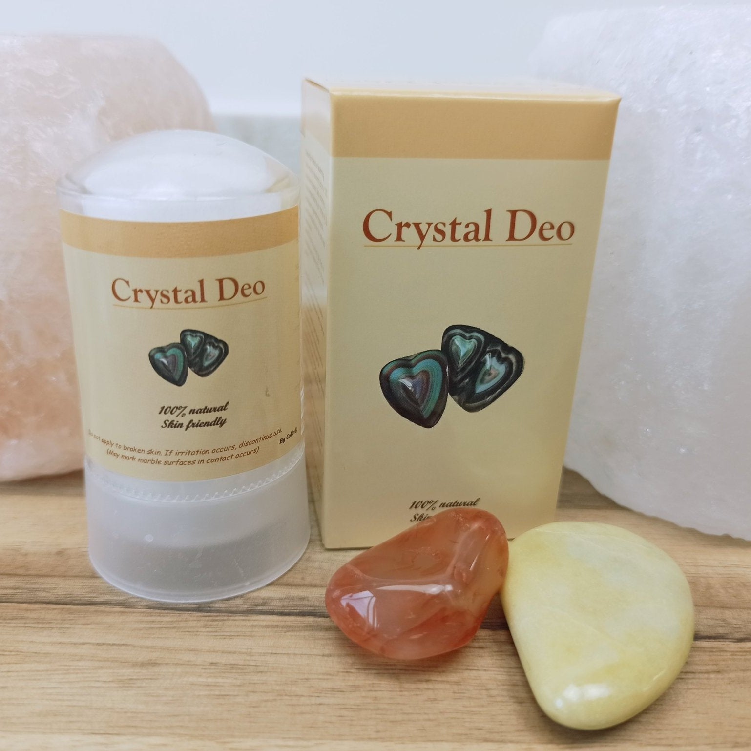 Crystal Deo zoutsteen deodorant met verpakking en edelstenen