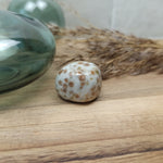 Groene granaat trommelstenen – curated crystal by Marga Jacobs | rust, symboliek en intuïtieve zelfzorg