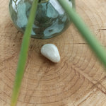 Hiddeniet trommelstenen – curated crystal by Marga Jacobs | rust, symboliek en intuïtieve zelfzorg