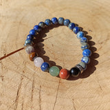Lapis Lazuli edelsteen armband met chakrastenen | 8 mm – curated crystal by Marga Jacobs | rust, symboliek en intuïtieve zelfzorg