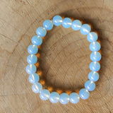 Opaliet edelsteen armband | 8 mm – curated crystal by Marga Jacobs | rust, symboliek en intuïtieve zelfzorg