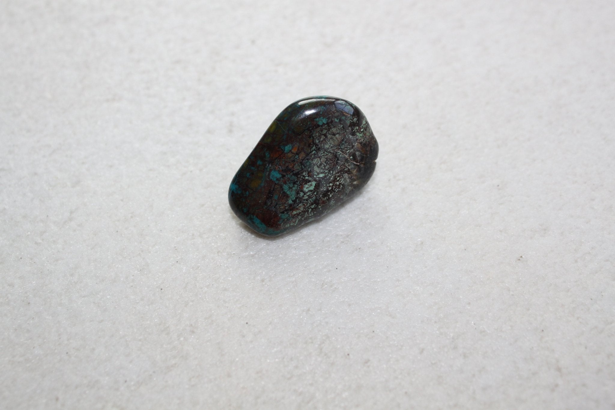 Quantum quattro trommelstenen – curated crystal by Marga Jacobs | rust, symboliek en intuïtieve zelfzorg