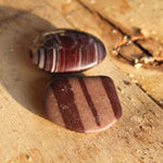 Shiva Lingam trommelstenen – curated crystal by Marga Jacobs | rust, symboliek en intuïtieve zelfzorg