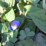 Tanzien Titanium Aura trommelstenen – curated crystal by Marga Jacobs | rust, symboliek en intuïtieve zelfzorg