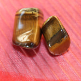 Tijgeroog trommelstenen – curated crystal by Marga Jacobs | rust, symboliek en intuïtieve zelfzorg