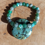 Turkoois handstenen – curated crystal by Marga Jacobs | rust, symboliek en intuïtieve zelfzorg