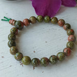 Unakiet edelsteen armband | 8 mm – curated crystal by Marga Jacobs | rust, symboliek en intuïtieve zelfzorg